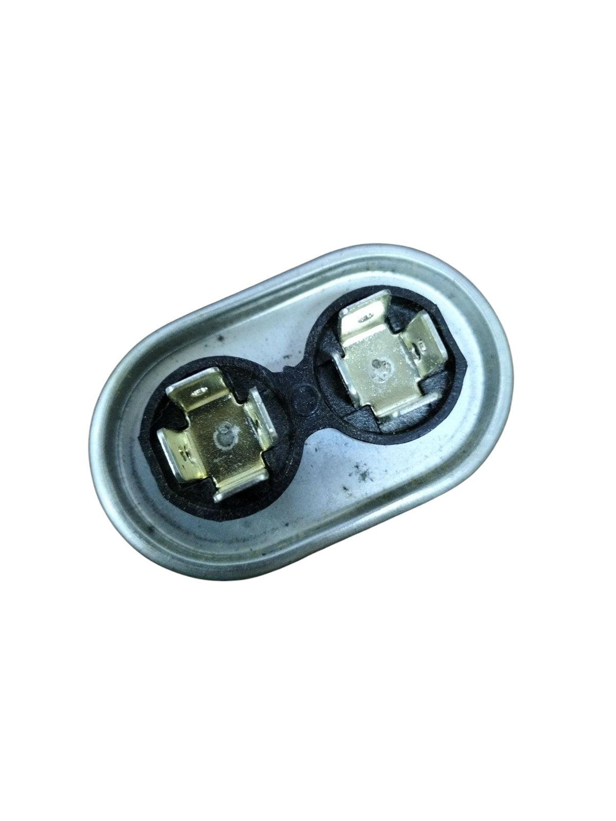 Mallory 440V running capacitor with dual terminals in a compact oval design for electrical applications