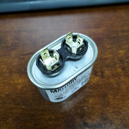 Mallory 440V running capacitor with dual terminals for electrical applications