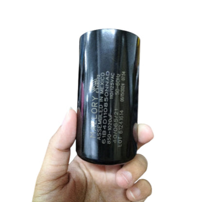 Mallory motor starting capacitor 850-1020UF 125V held in hand showing the black cylindrical design