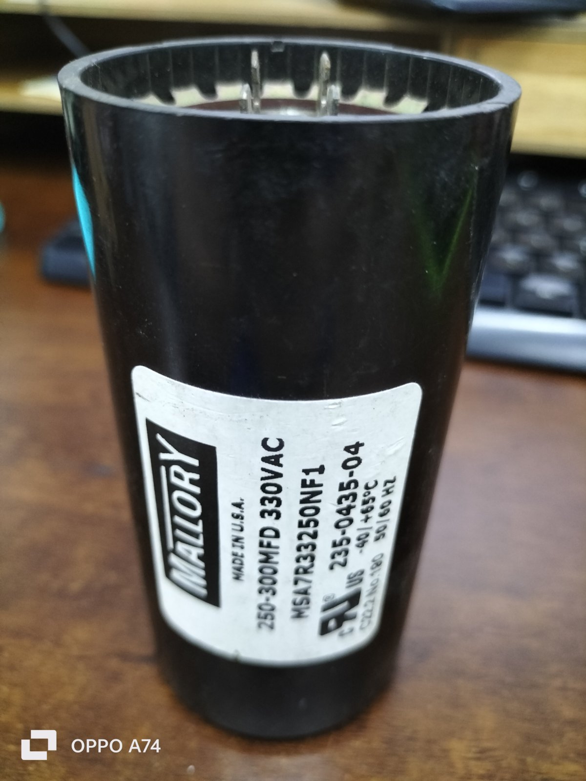 Mallory electrical starting capacitor 250-300 MFD 330 VAC black cylindrical component