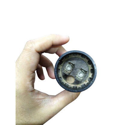 Mallory Starting Capacitor 72-86MFD held in hand with clear terminal connections for easy installation