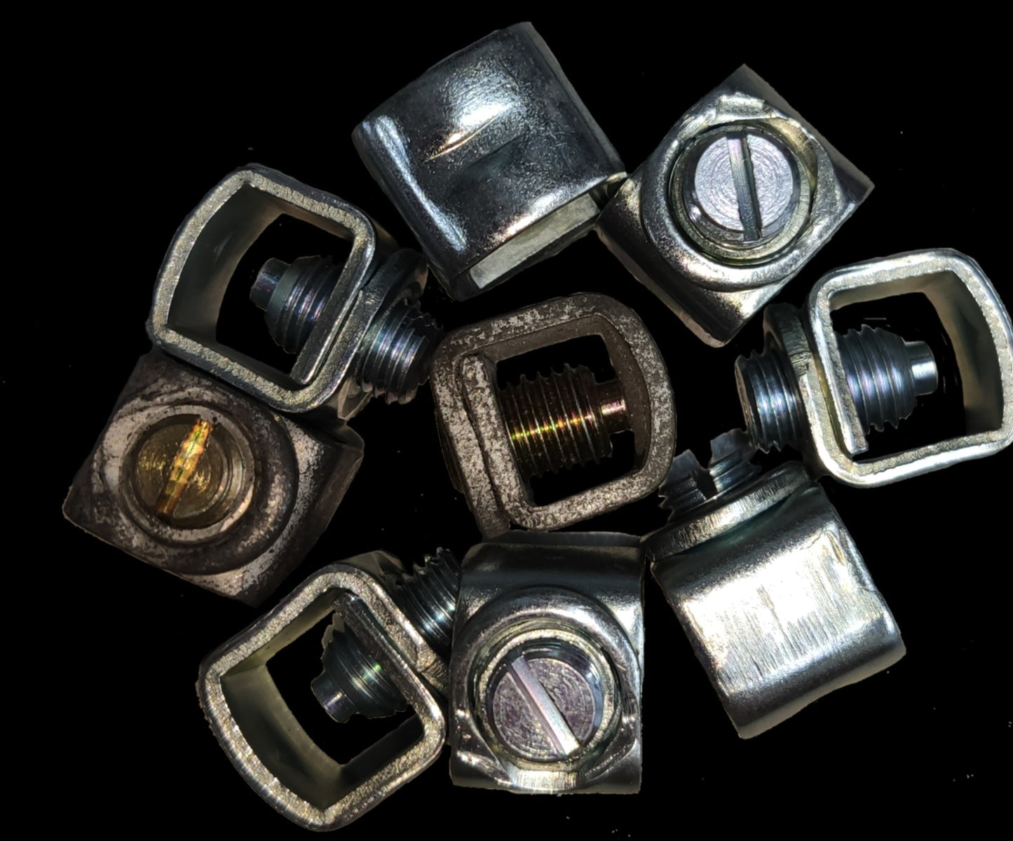 Mechanical lugs for GE bolt-on breaker, showing various angles of high-quality electrical connectors