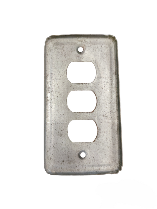 Metal switch cover 3 gang from China with a raw, industrial finish for power points and plugs