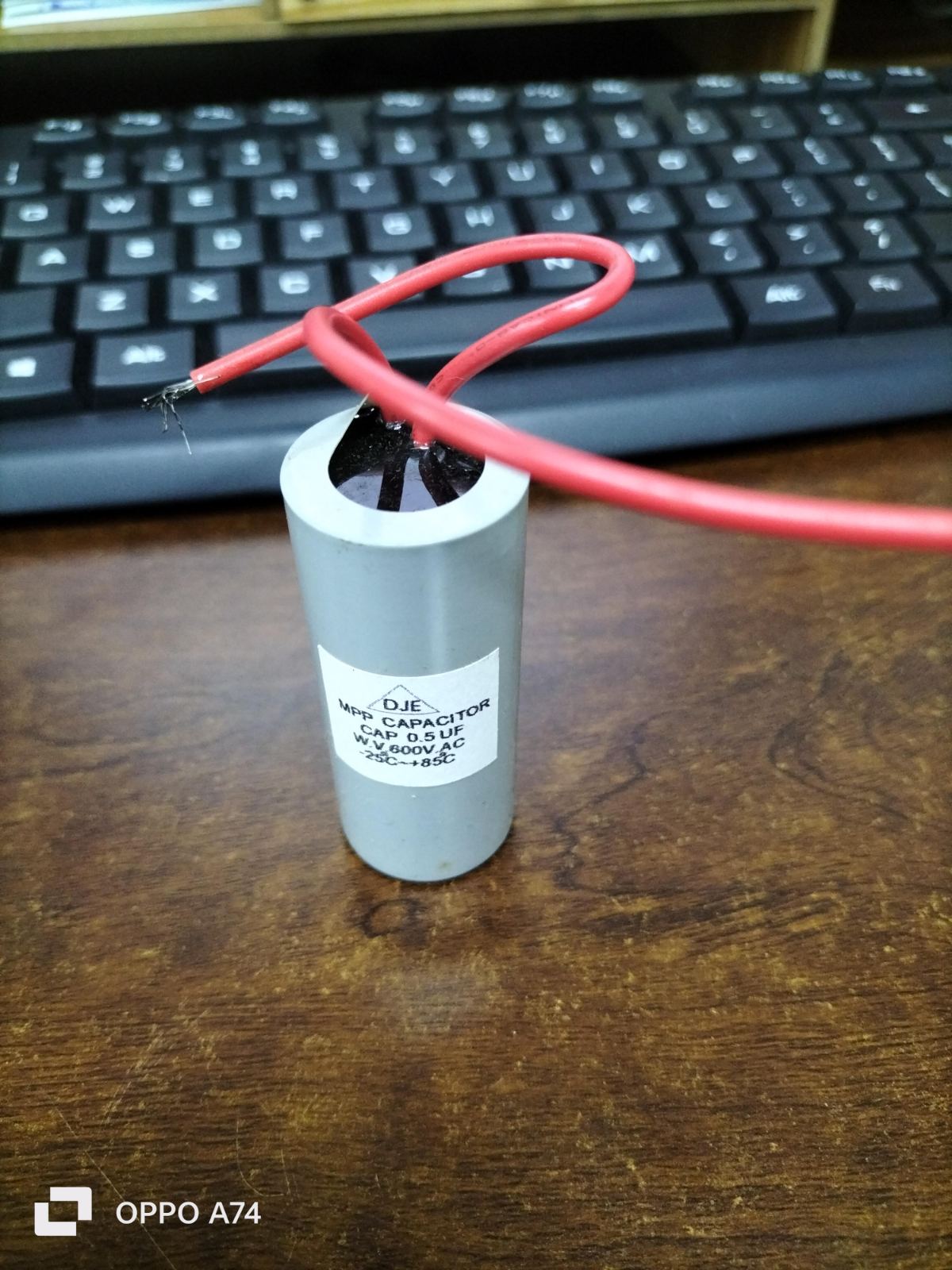 DJE motor capacitor with red wire
