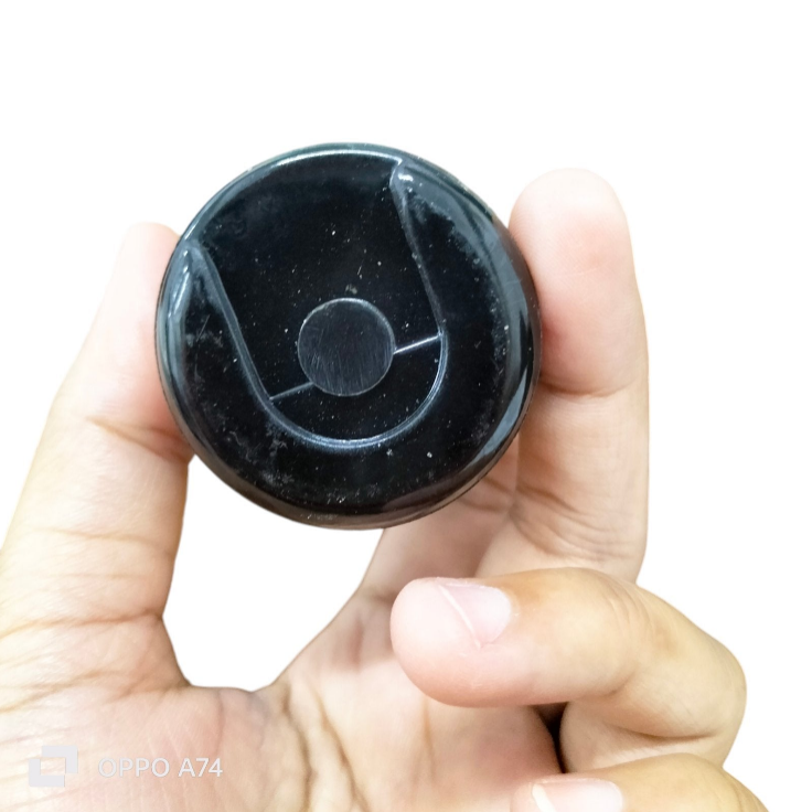 BMI Motor Starting Capacitor 270-324 UF held in hand, designed for enhancing motor efficiency