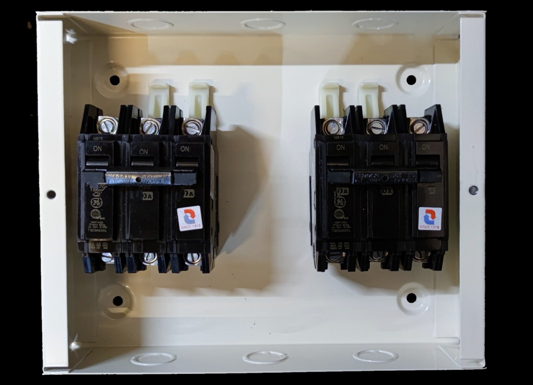MTS 20A 3 Pole Three Phase electrical component mounted on white panel by Koten and GE