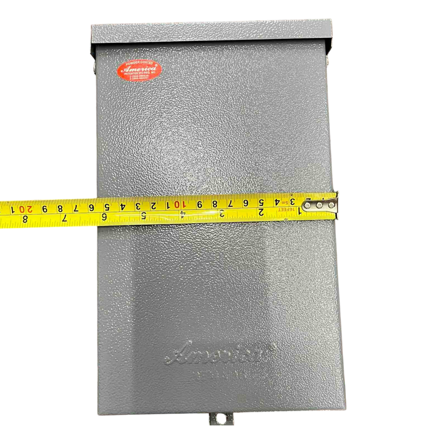 Nema 3R panel board housing in gray with measurement tape for size reference