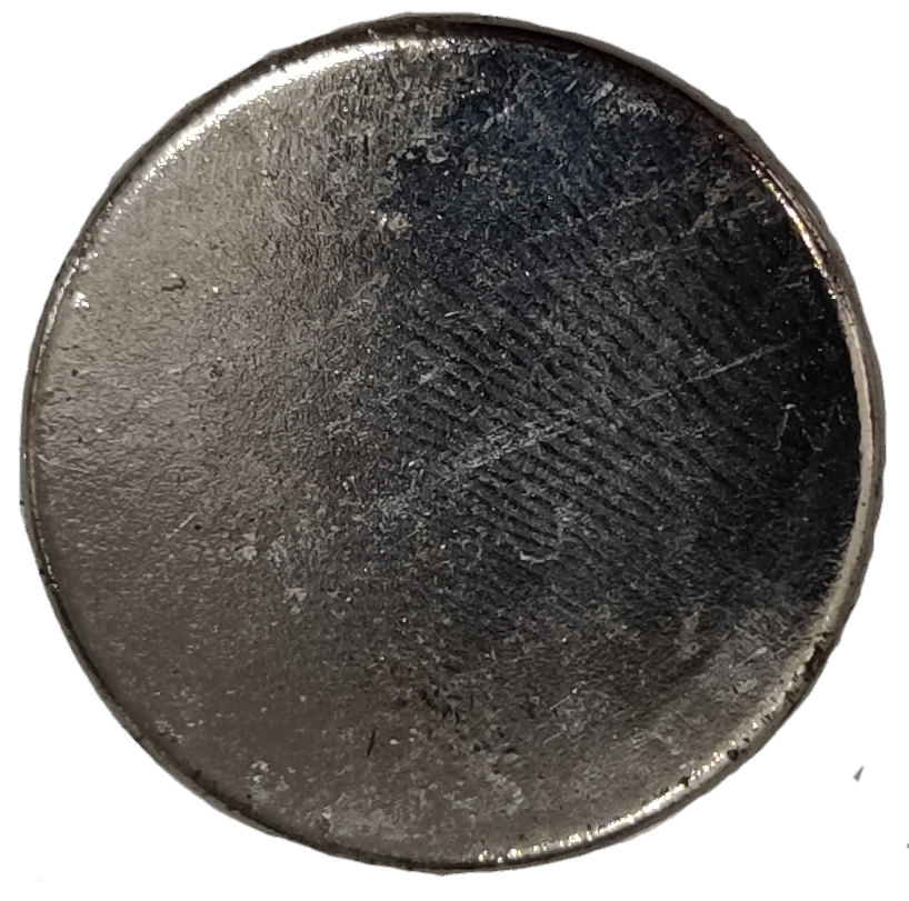 Close-up of a shiny silver Neodymium Magnet 3cm Diameter used for handicraft materials