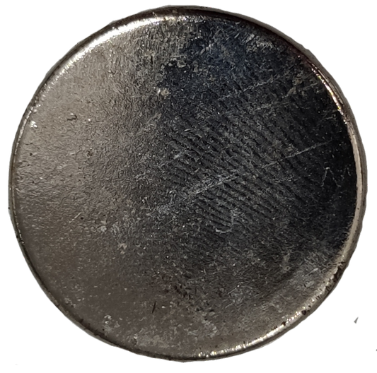 Close-up of a shiny silver Neodymium Magnet 3cm Diameter used for handicraft materials