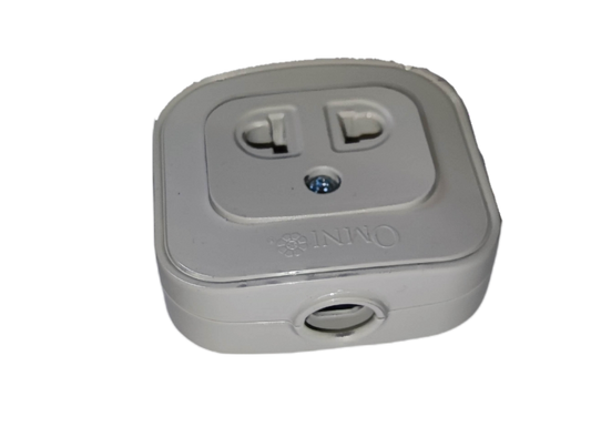 Omni 10A 250V single surface outlet in white with two sockets and a flush design