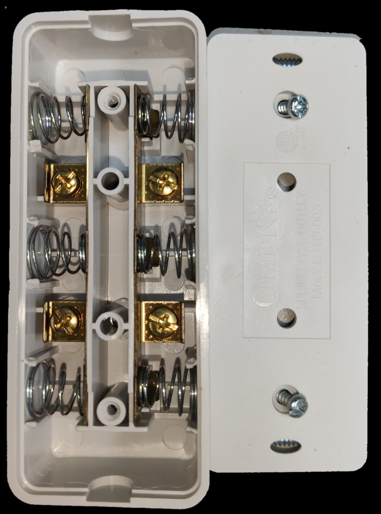 Omni 3 gang extension outlet with white casing showing internal springs and brass connectors
