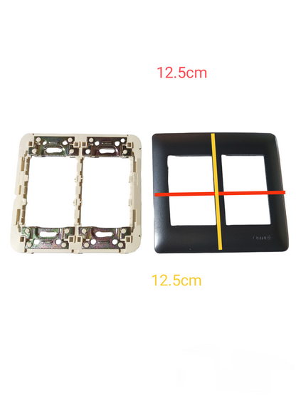 Omni 6 Gang Plate Cover Graphite shown with metal frame measuring 12.5 cm square