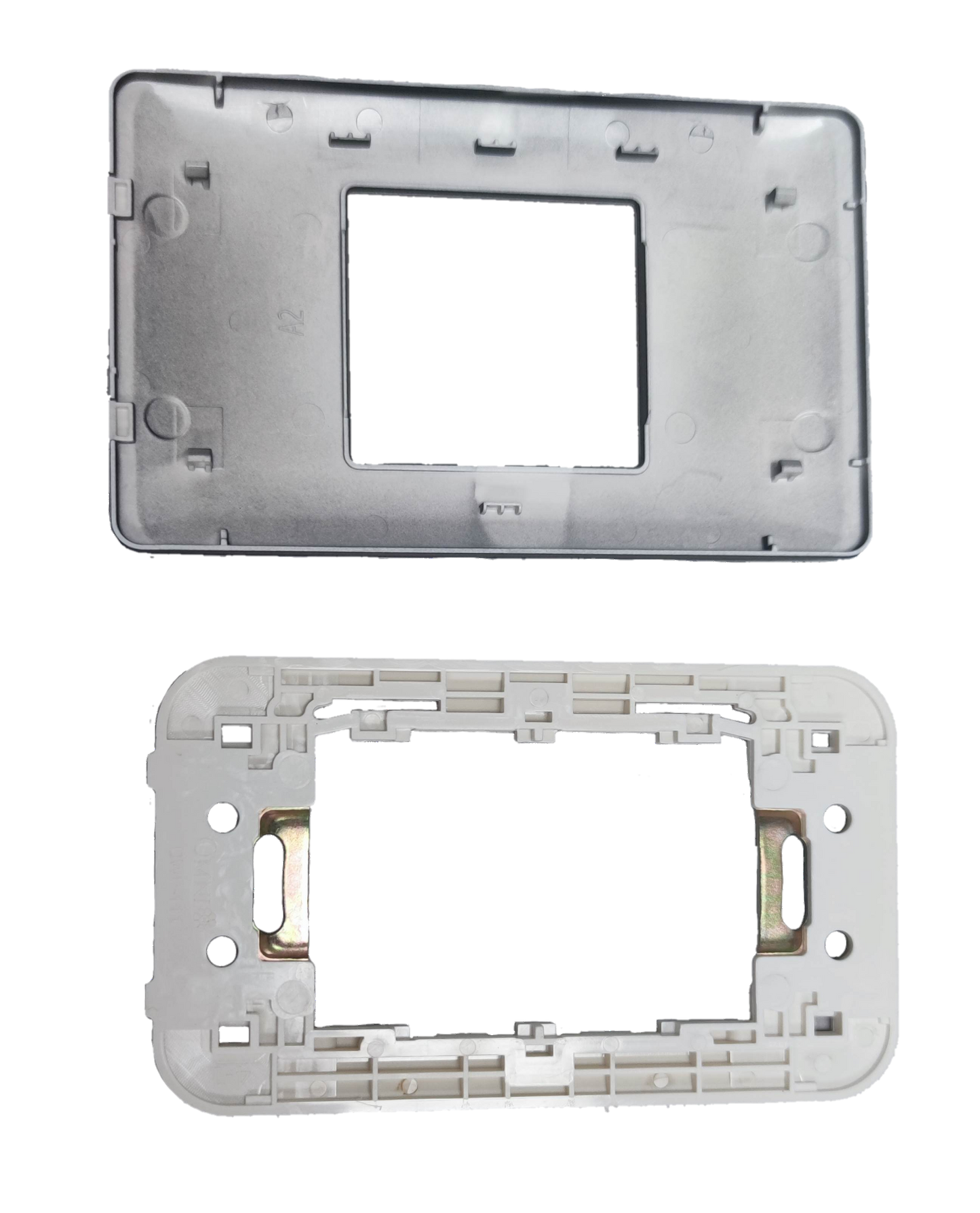 Omni Center Device Plate Graphite showing front and back plastic mounting frames for power points and switches