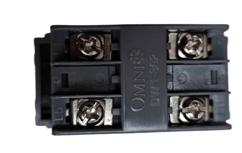 Omni graphite telephone wall jack module with four screw terminals close up for residential wiring