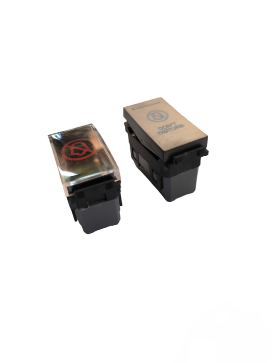 Omni power point switch with black base and translucent top featuring red and blue symbols