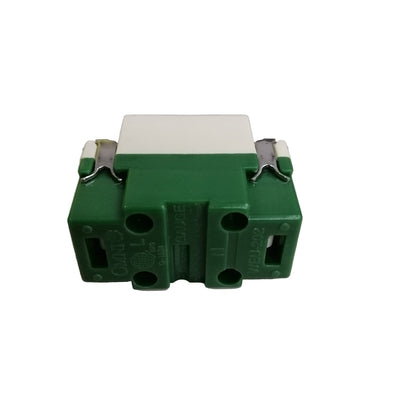 Omni universal outlet 16A 250V with a green casing and dual connection ports for electrical circuits