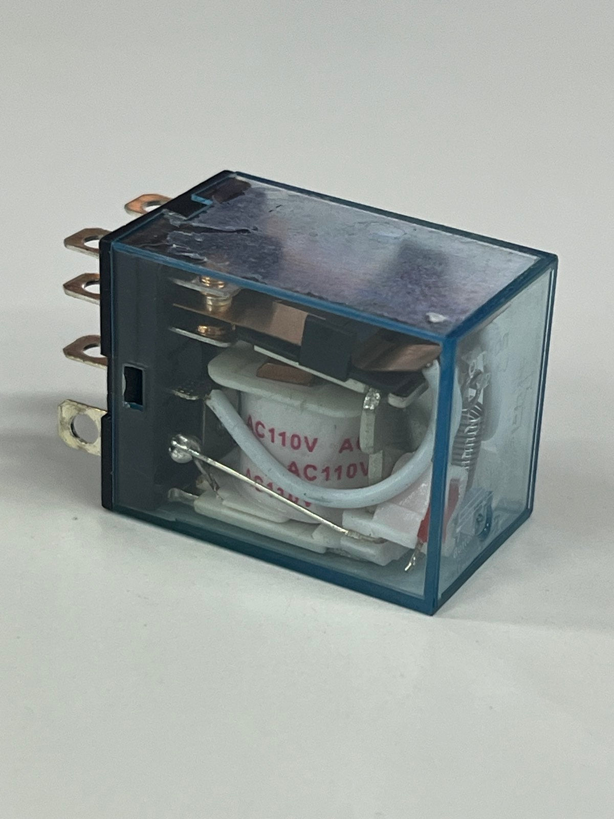 Omron LY2NJ relay 110V 8 Pins with transparent casing showing internal components