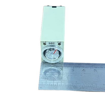 OMRON relay timer with clear seconds dial and red pointer next to ruler for scale Timer Relay 30 seconds 8 pins 110V