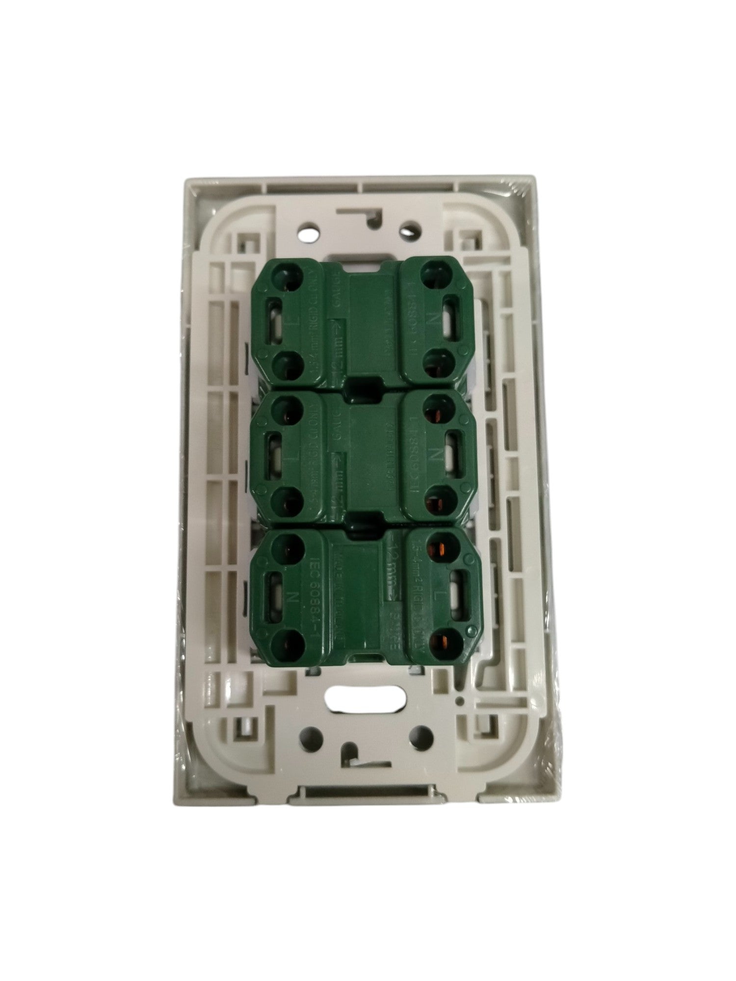 Panasonic 3 gang universal outlet with green sockets and white mounting frame for power points