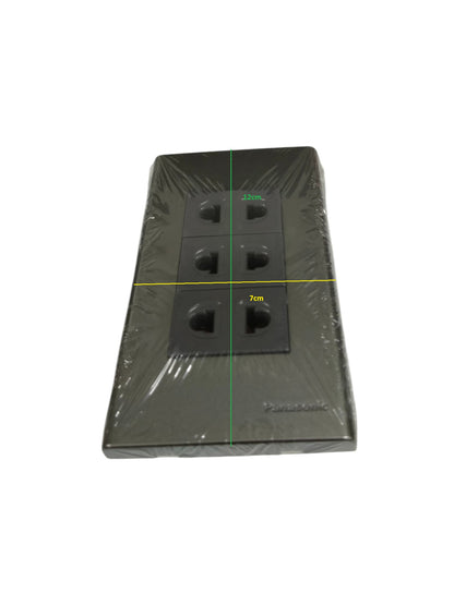 Panasonic 3 gang universal outlet with black finish and three plug sockets in a rectangular frame