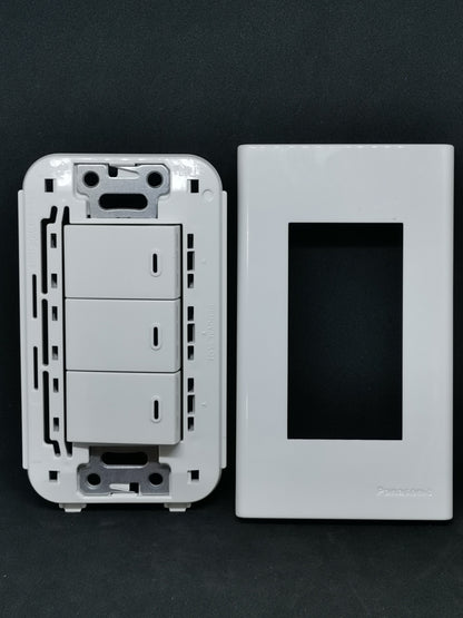 Panasonic Wall Switch 3 Devices WEG5001-K white triple rocker module with matching faceplate on black background