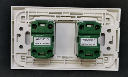 Panasonic WEG1001-5 WEG6802 outlet installed in a white wall plate for electrical use