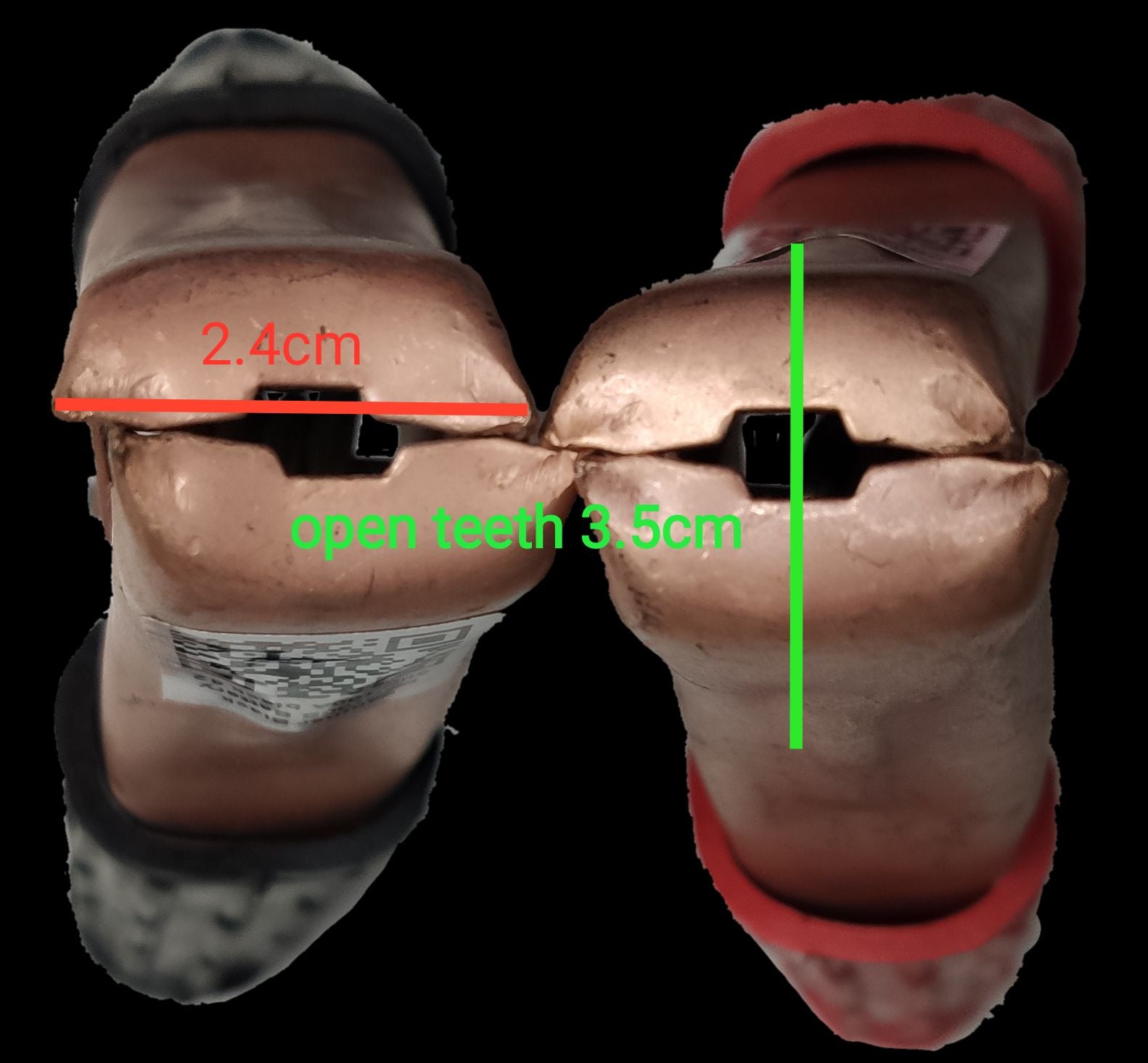 Panther 100A battery clips close-up showing copper clamps with open teeth measurement