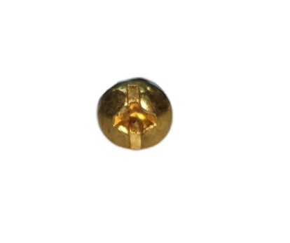 Close-up of a Philips Cross Positive Screw small with a gold finish on black background