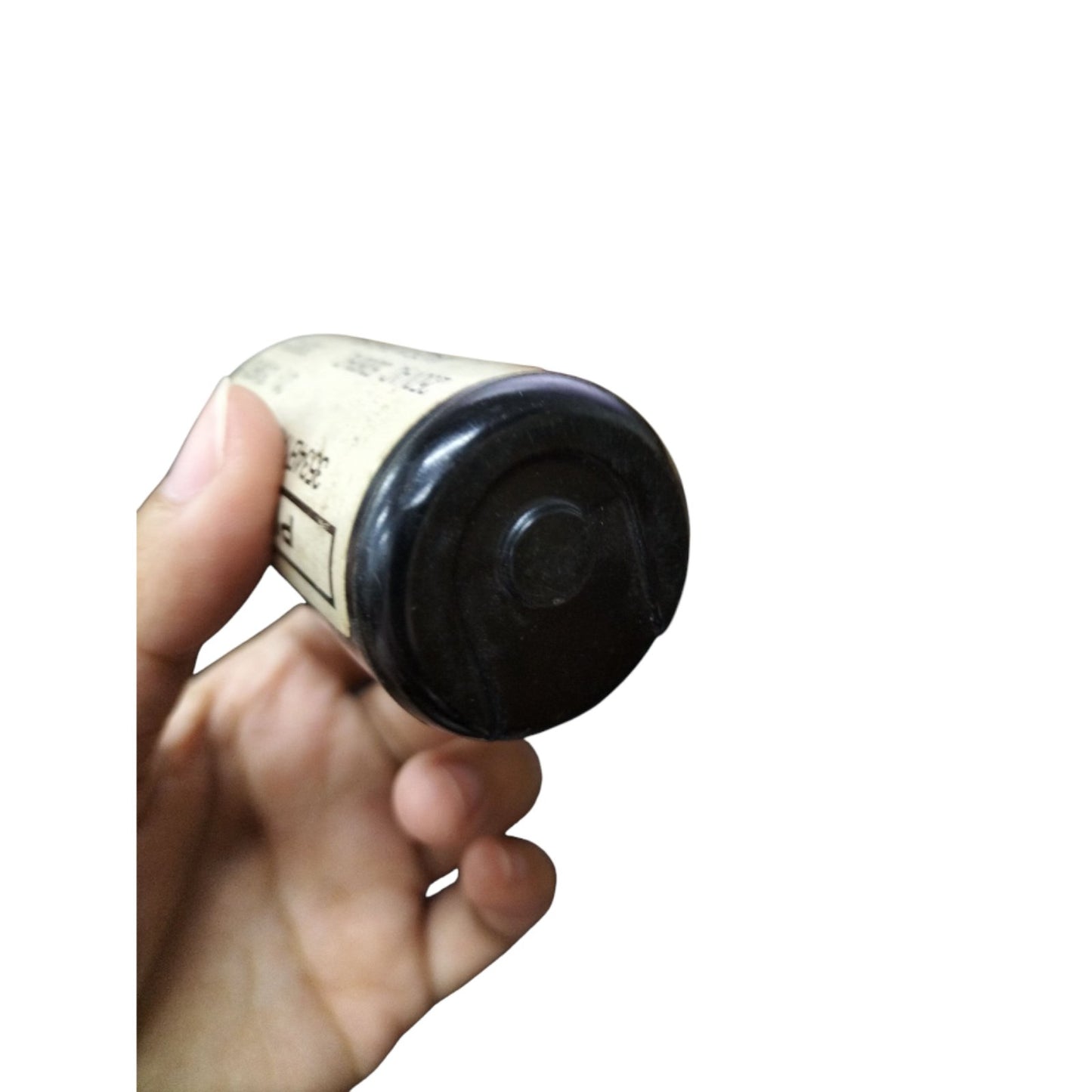 Philips Motor Capacitor 21-25uF 220V held in hand for electrical circuitry applications