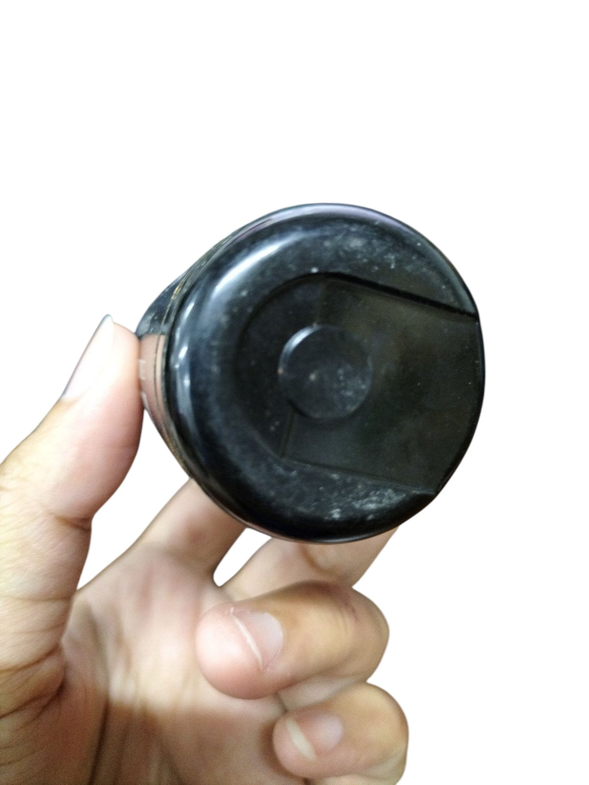 Philips motor starting capacitor 130-156UF in a compact black casing held in hand