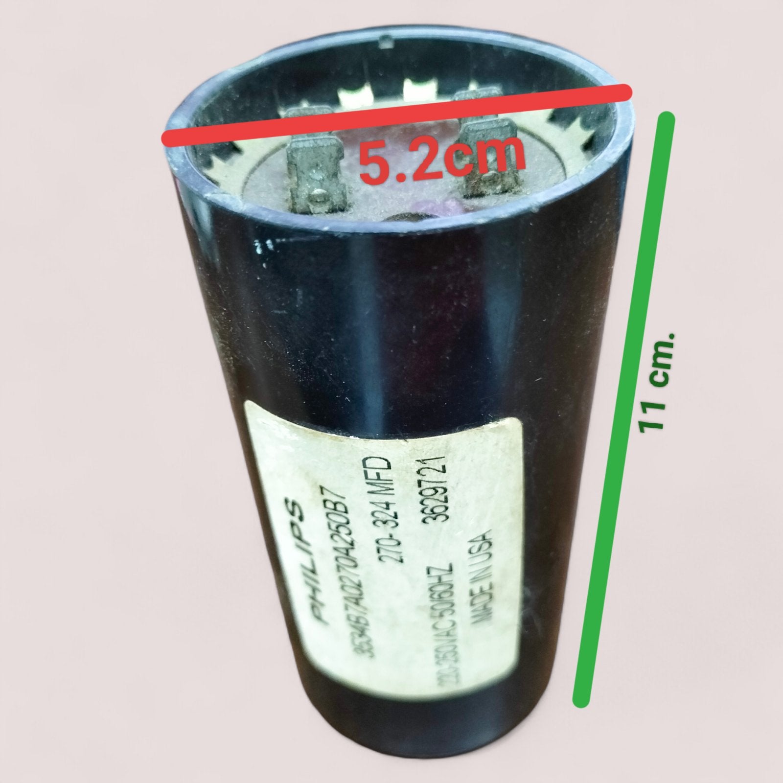 BMI Motor Starting Capacitor 270-324 UF black cylindrical electrical part with metal terminals