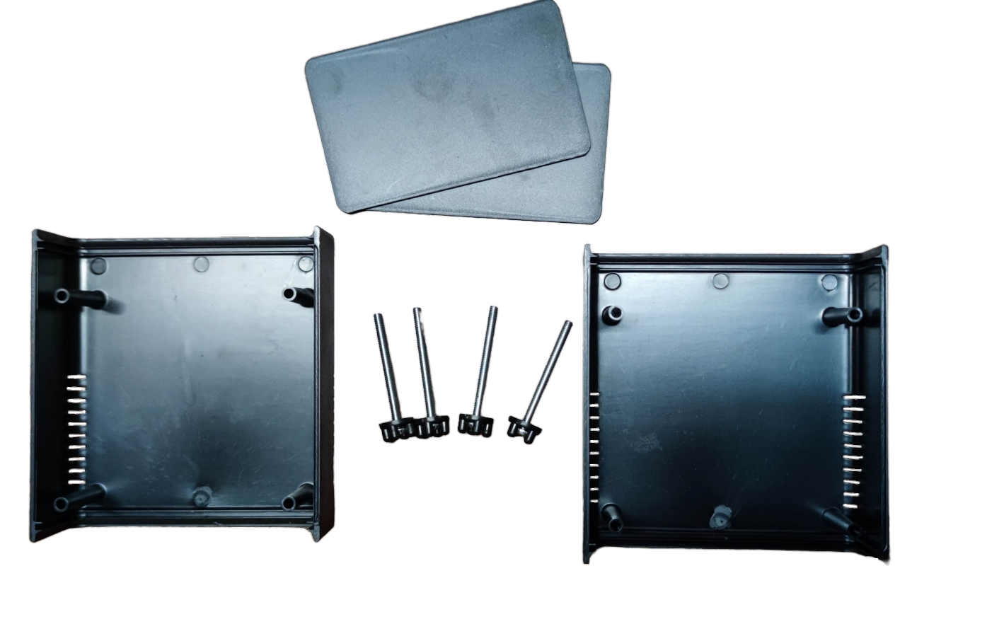 Two black PVC boxes for wiring and assembly with screws and covers included for electrical projects