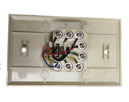 Back view of Taiwan made RJ45 wall socket for ethernet showing wiring and screw terminals