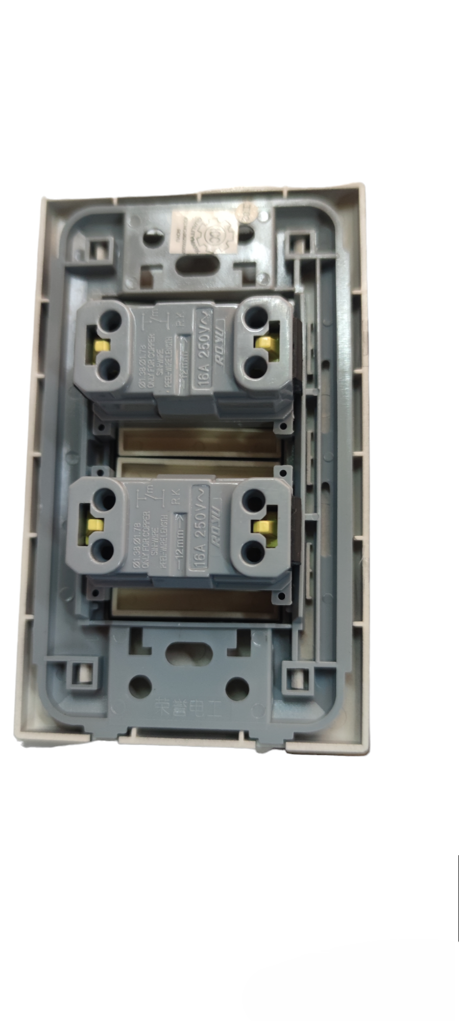 Internal view of Royu Switch Flush 10A 250V Black showing mounting and wiring terminals