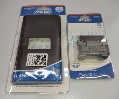 Royu 1 gang 3 way switch and matching black faceplate from the Plano series in package