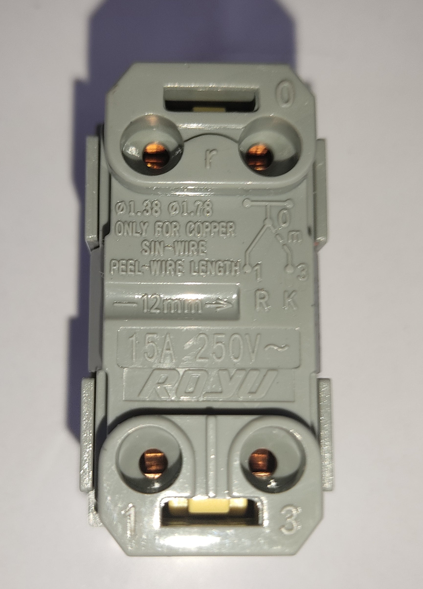 Royu 3 Way Switch Device Dark Gray modular switch module showing four copper terminals and wiring labels