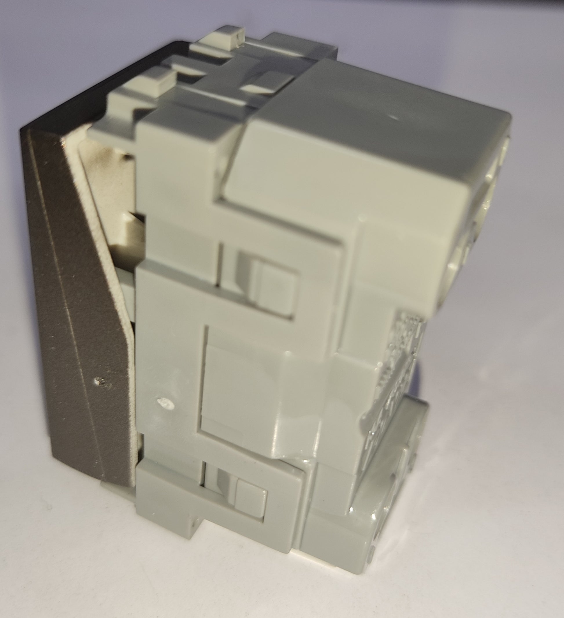 Royu 3 Way Switch Device Dark Gray modular electrical switch module with gray plastic body and dark gray faceplate