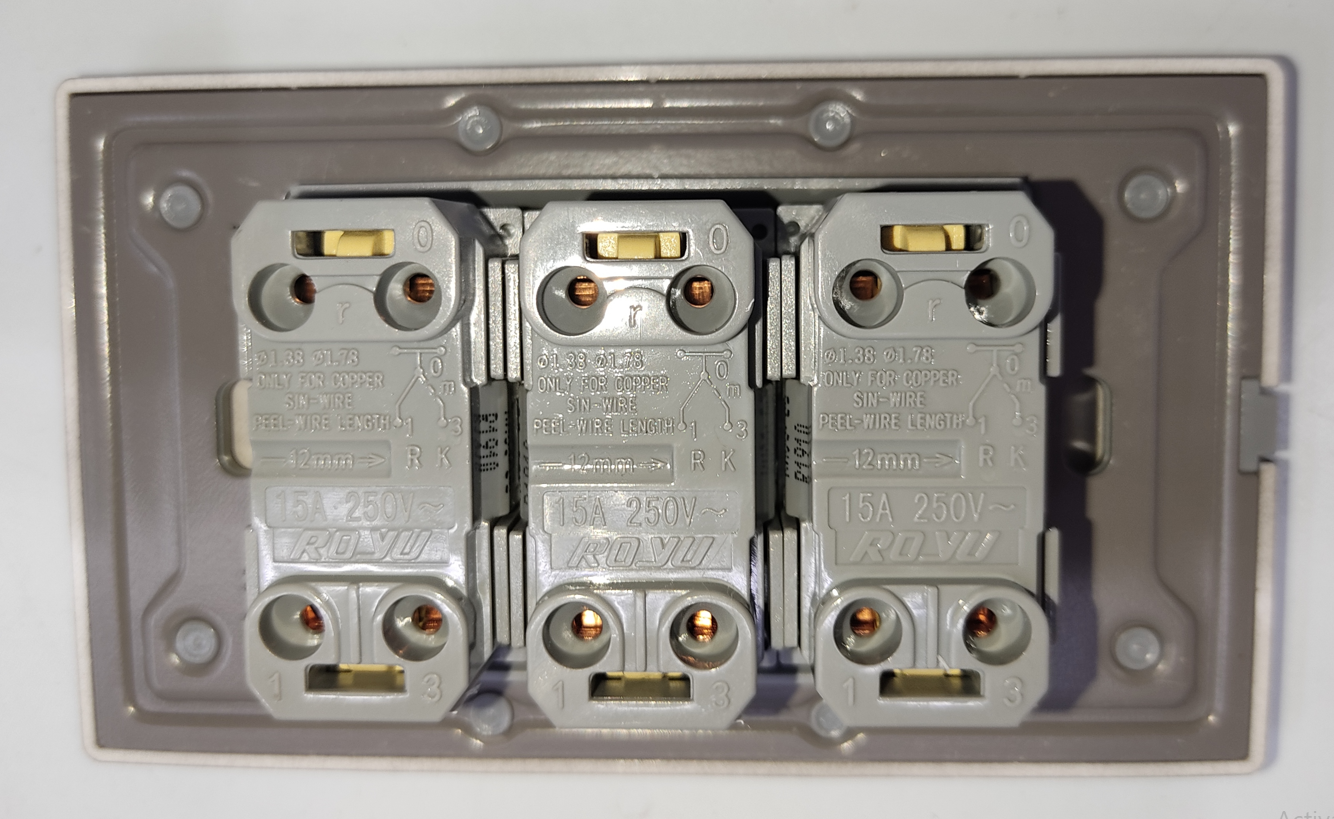Royu 3 Way Switch with Plate Dark Gray Plano three gang switch mechanism rear view with terminals
