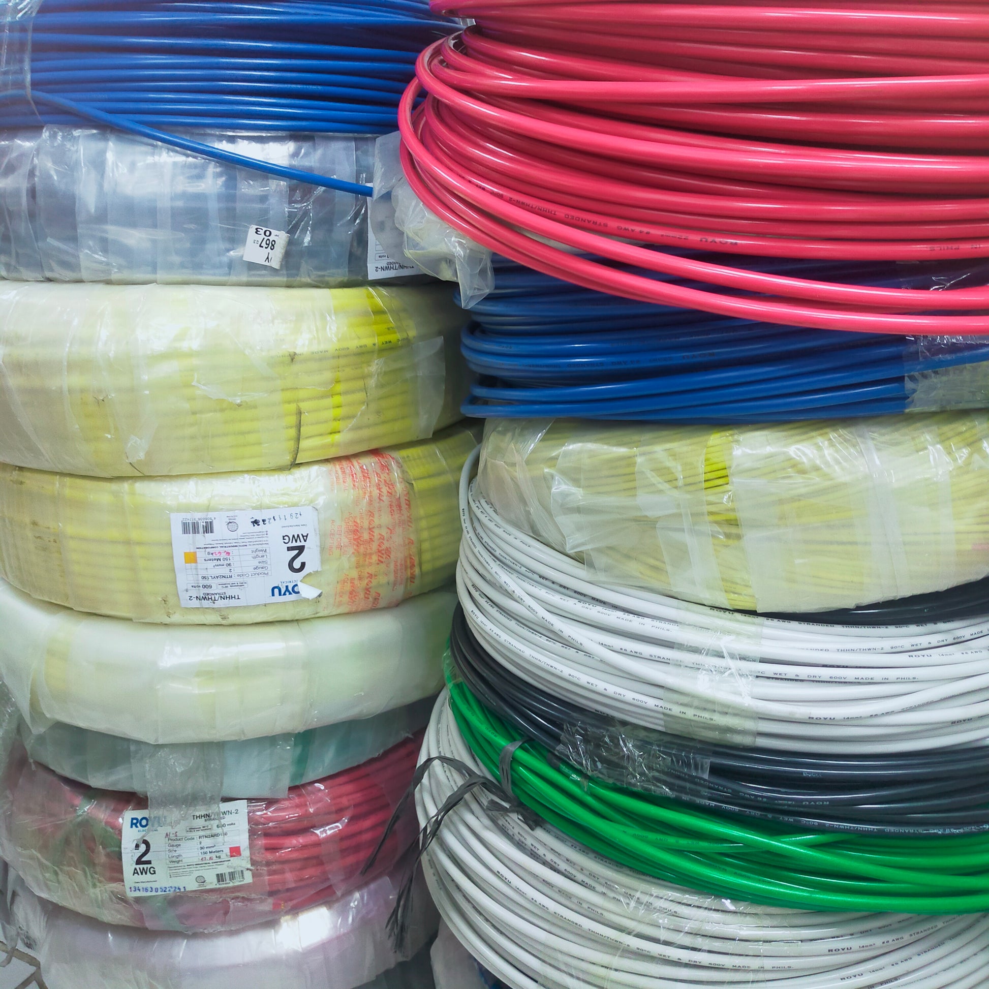 Royu THHN wire 2 AWG stranded in various colors stacked for electrical projects