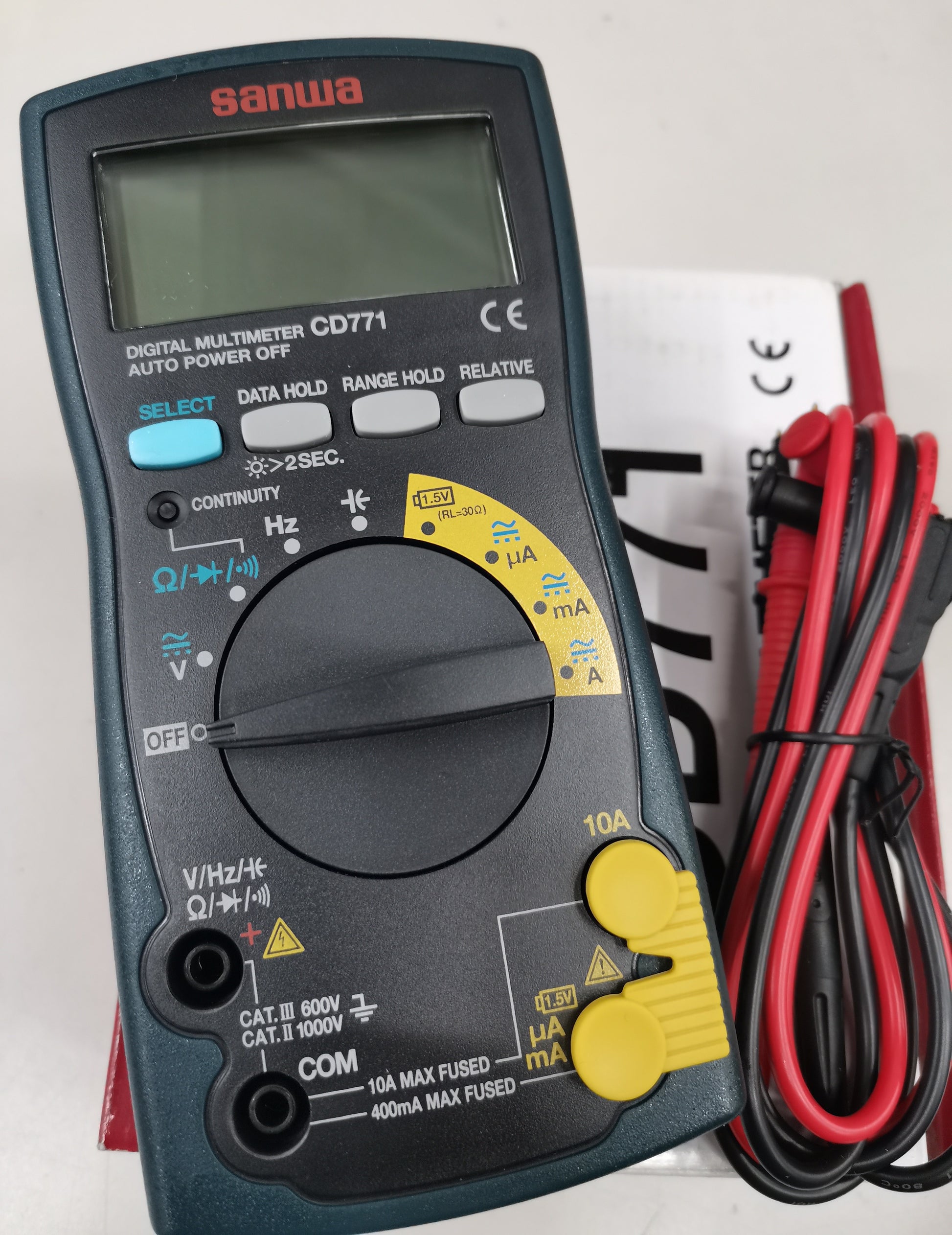 Sanwa CD771 Digital Multimeter with dial settings and red black test leads for electrical measurements