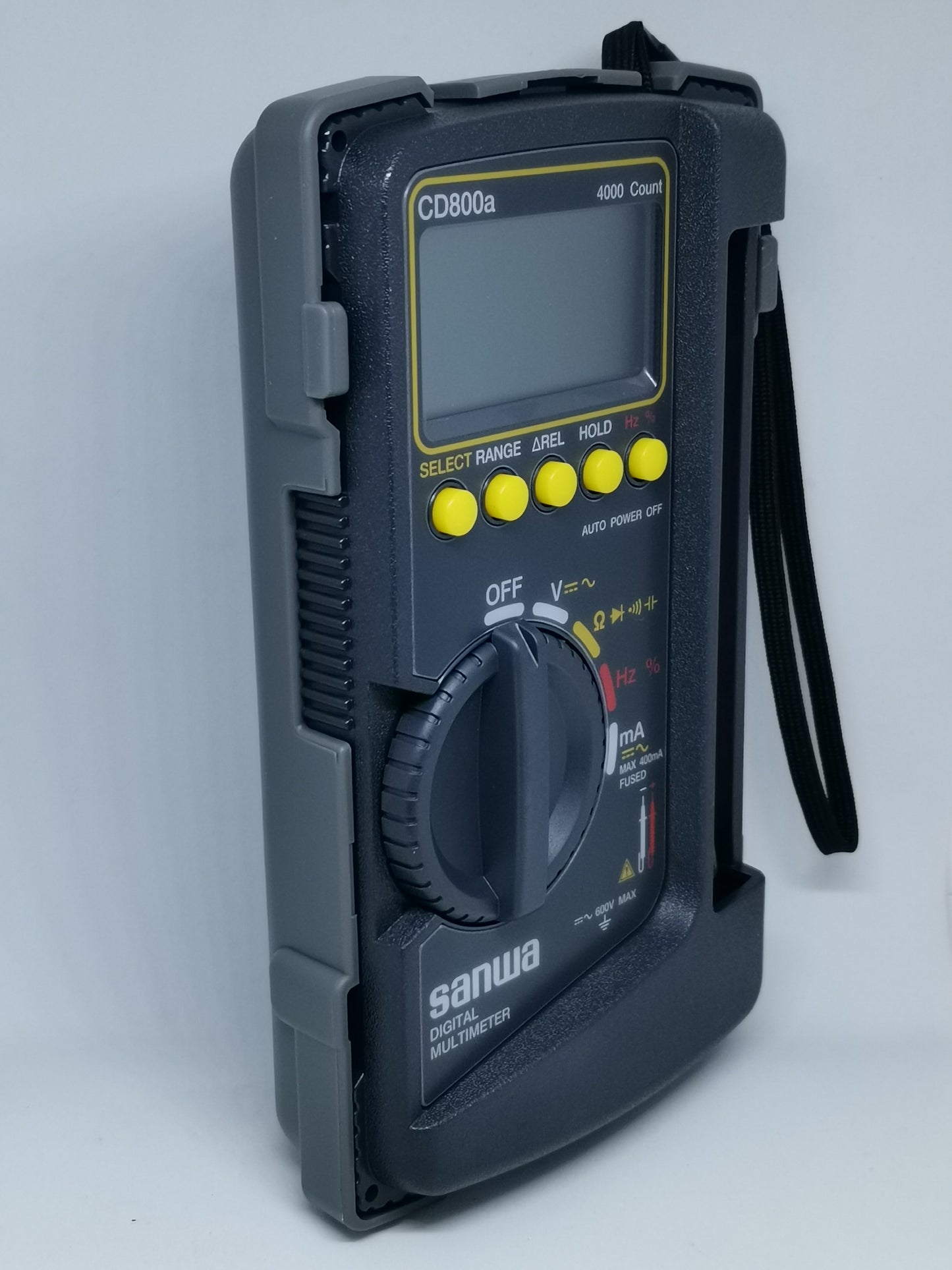 Sanwa CD800a Digital Multimeter with protective casing and yellow function buttons for electrical testing