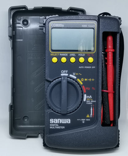 Sanwa CD800a Digital Multimeter with protective case and red test probe for electrical measurements