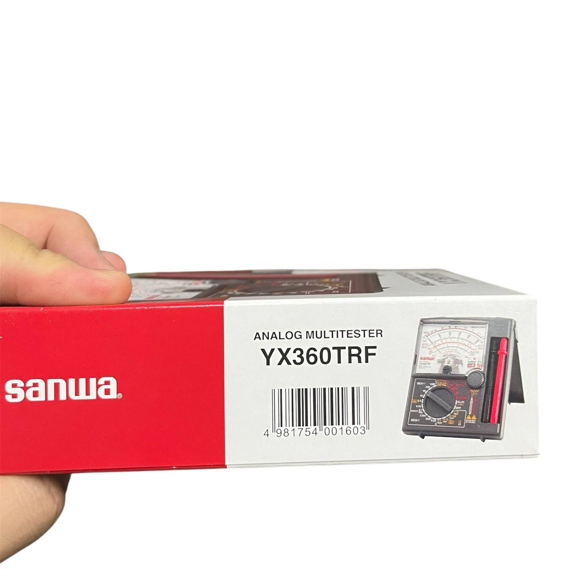 Sanwa Multi-tester YX360TRF analog multimeter box held in hand for electrical testing