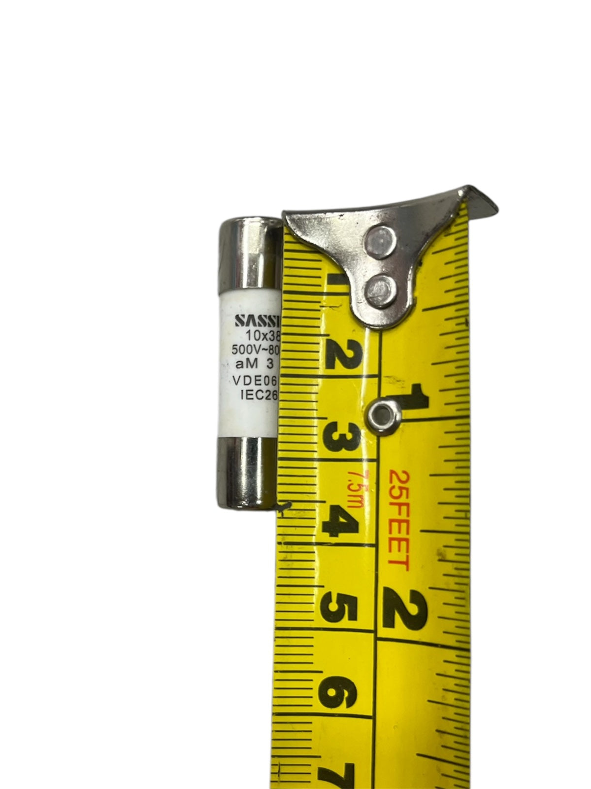 Ceramic Fuse 3A 500V 10x38mm with metal caps shown next to yellow measuring tape