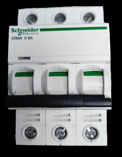 Schneider 6A 3 pole miniature circuit breaker with white casing and green labels for electrical protection
