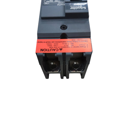Schneider 40A 2 Pole Breaker Industrial Easy Pact molded case circuit breaker showing dual terminal connections and caution label