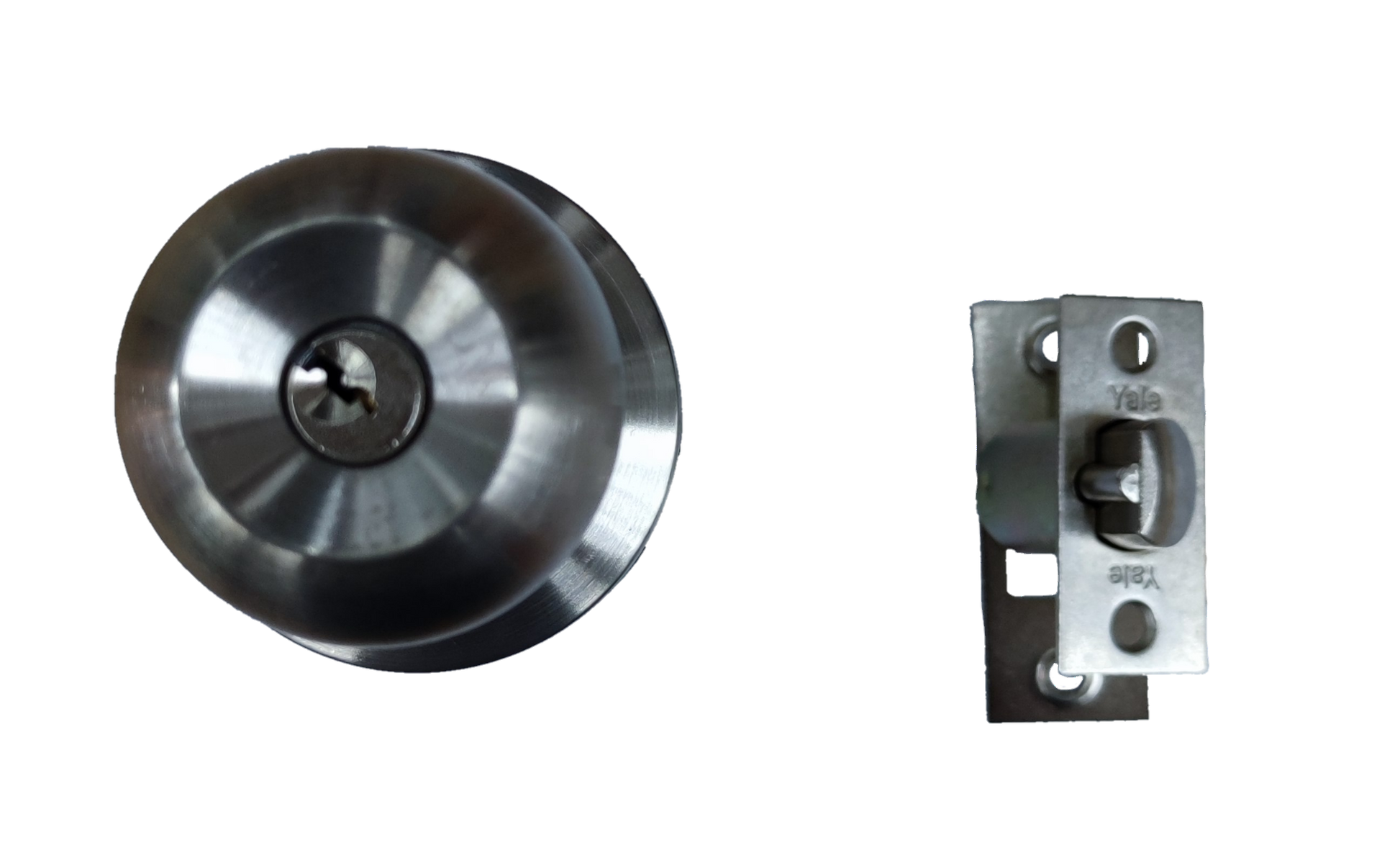 Yale stainless steel round door knob with latch assembly on black background Entrance Lockset Essential Series
