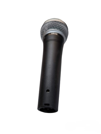 Shure Microphone Condenser with black body and silver mesh grille isolated on white background