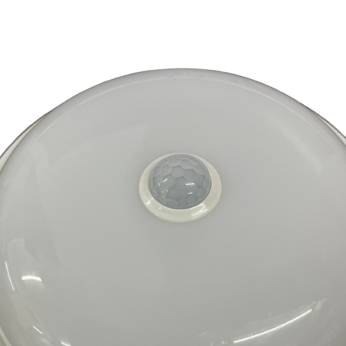 Shuta 18W Motion Sensor LED Light Round with white smooth surface and central motion sensor dome