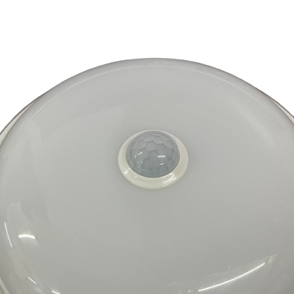 Shuta 18W Motion Sensor LED Light Round with white smooth surface and central motion sensor dome
